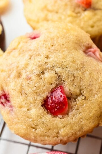 Strawberry banana muffins made with ripe bananas and fresh strawberries.