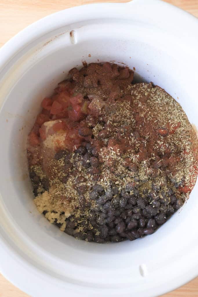 Crockpot Mexican chicken ingredients combined before cooking.
