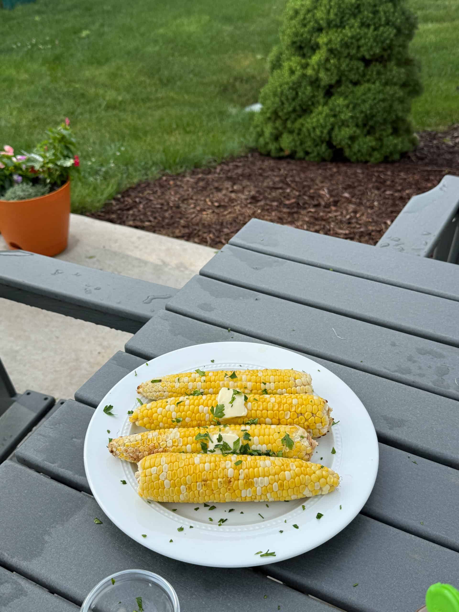 Grilled corn on the cob served as an easy summer side dish.