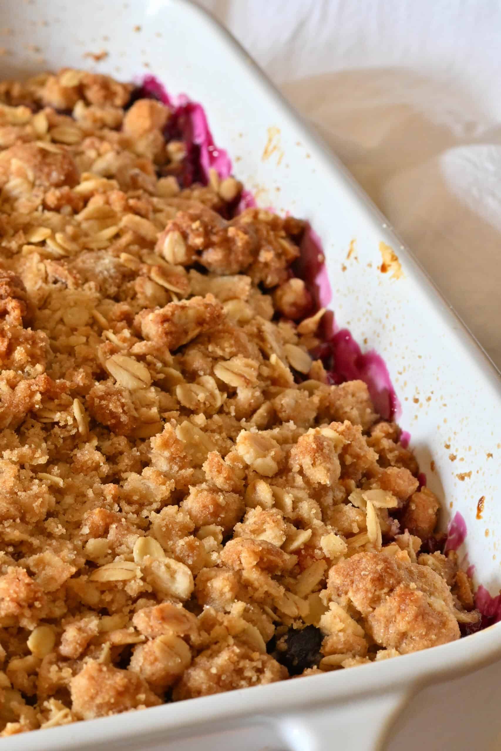 A buttery crisp topping juicy blueberries and strawberries.